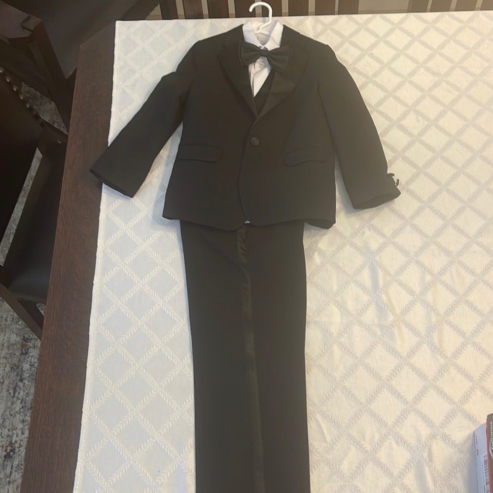 Like new, worn once boys Nautica size 7 tuxedo